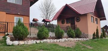 Фото номера Коттедж с 6 спальнями Дома для отпуска Cabana Popasul Vânătorului г. Арьешени 8