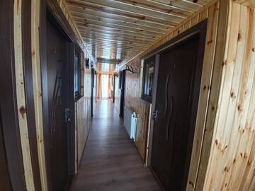 Фото номера Коттедж с 6 спальнями Дома для отпуска Cabana Popasul Vânătorului г. Арьешени 48