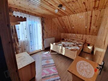 Фото номера Коттедж с 6 спальнями Дома для отпуска Cabana Popasul Vânătorului г. Арьешени 42