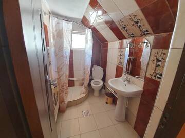 Фото номера Коттедж с 6 спальнями Дома для отпуска Cabana Popasul Vânătorului г. Арьешени 50