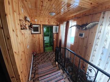 Фото номера Коттедж с 6 спальнями Дома для отпуска Cabana Popasul Vânătorului г. Арьешени 52