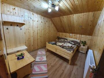 Фото номера Коттедж с 6 спальнями Дома для отпуска Cabana Popasul Vânătorului г. Арьешени 59