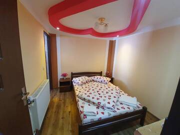 Фото номера Коттедж с 6 спальнями Дома для отпуска Cabana Popasul Vânătorului г. Арьешени 57