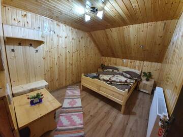 Фото номера Коттедж с 6 спальнями Дома для отпуска Cabana Popasul Vânătorului г. Арьешени 16