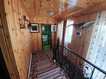 Фото номера Коттедж с 6 спальнями Дома для отпуска Cabana Popasul Vânătorului г. Арьешени 24