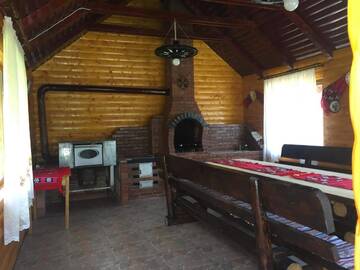 Фото номера Коттедж с 6 спальнями Дома для отпуска Cabana Popasul Vânătorului г. Арьешени 7